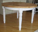 stół okrągły rozkładany z białymi nogami